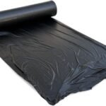 Black mulch film roll for weed suppression and soil moisture protection in crop fields